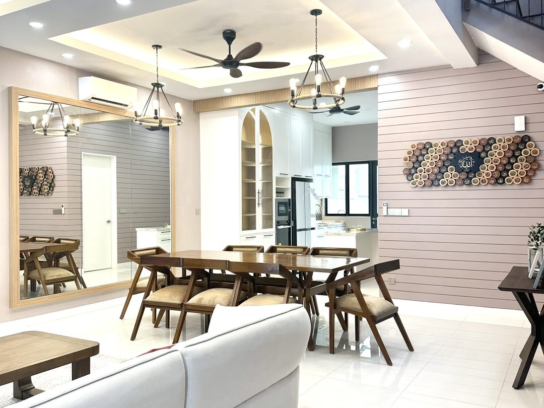 Open-plan living and dining with a blush slatted feature wall and timber dining set